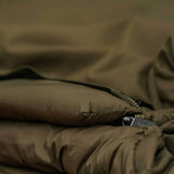 Bed Chair con saco de dormir Avid Carp Revolve System - Tienda Carpfishing